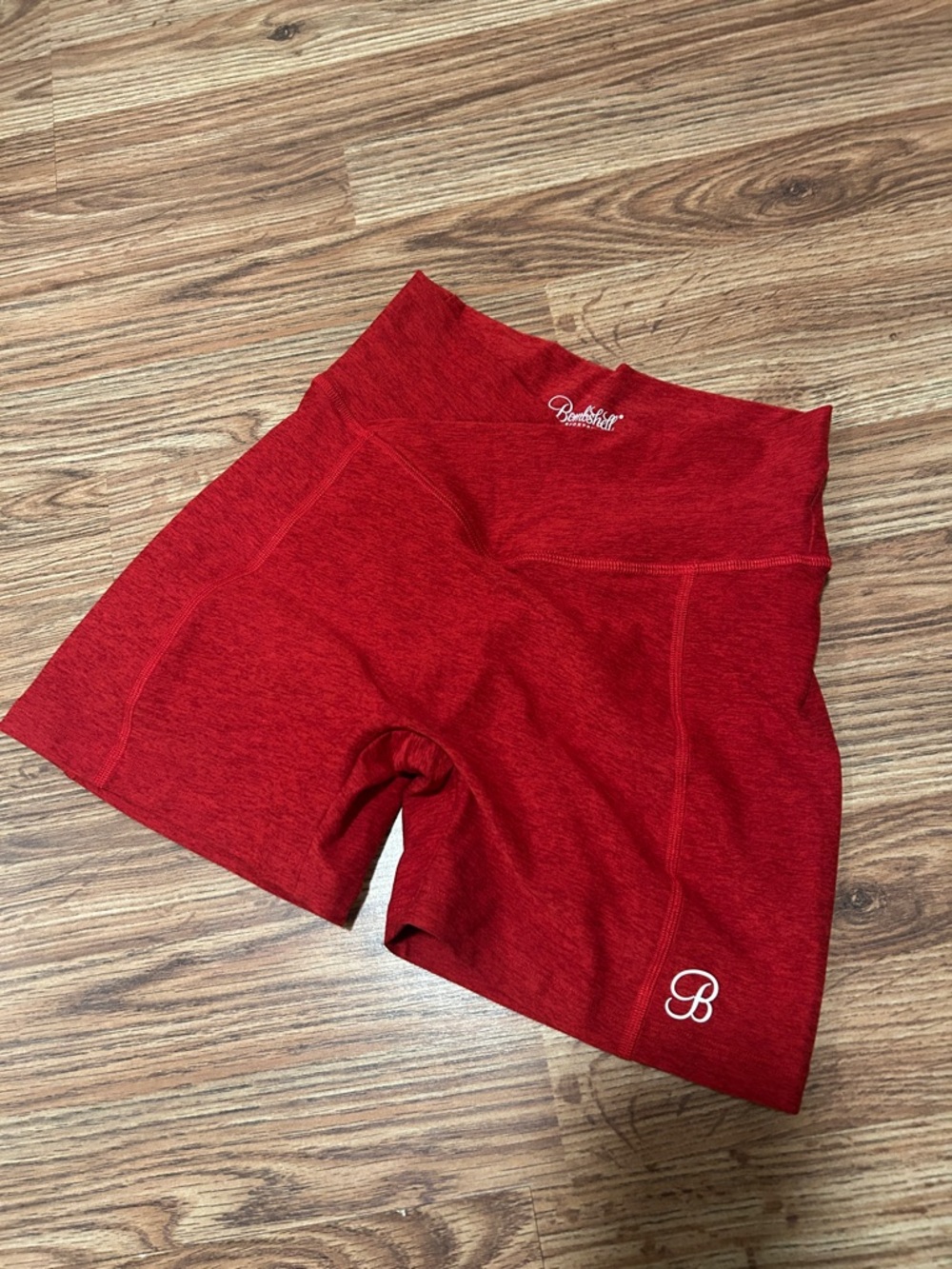 BOMBSHELL SPORTSWEAR TINY WAIST SHORTS